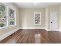 Bright living room featuring hardwood floors and large windows at 776 Brookline Sw St, Atlanta, GA 30310