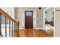 Hardwood floors and a view of the staircase at 7801 Windswept Way, Douglasville, GA 30135