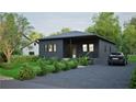 Modern dark-grey house with landscaped lawn and driveway at 639 Ozburn, Atlanta, GA 30318