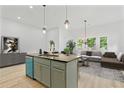Stylish kitchen island overlooking the living area, perfect for entertaining guests at 639 Ozburn, Atlanta, GA 30318