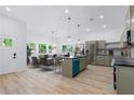 Bright and airy open-concept living space with modern finishes and wood floors at 639 Ozburn, Atlanta, GA 30318