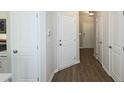 Bright entryway with hardwood floors and neutral-colored walls at 2920 Ilir Nw Mnr, Atlanta, GA 30318