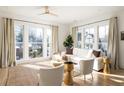 Bright living room with white couch and large windows at 1870 Vigo Ne St, Atlanta, GA 30307