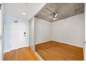 Bright bedroom with hardwood floors and sliding glass partition at 563 Memorial Se Dr # 405, Atlanta, GA 30312