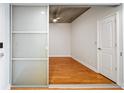 Bedroom with hardwood floors and sliding glass door at 563 Memorial Se Dr # 405, Atlanta, GA 30312