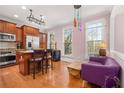 Eat-in kitchen with island seating and hardwood floors at 2827 Overlook Ne Trce, Atlanta, GA 30324