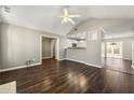 Open concept living space with hardwood floors at 341 Harris Ave, Locust Grove, GA 30248