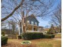 Spacious backyard with a tree and a hanging swing seat at 107 Watson Se Cir, Atlanta, GA 30317