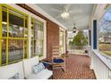 Relaxing front porch with seating and a view of the neighborhood at 107 Watson Se Cir, Atlanta, GA 30317