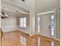 Bright entryway with hardwood floors and view of dining room at 2714 Legislative Ln, Buford, GA 30519