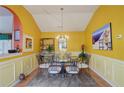 Dining room with decorative chandelier and natural light at 3529 Flowering Spgs, Powder Springs, GA 30127