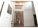 Bright entryway with hardwood floors and staircase at 500 Chimney House Ct, Stone Mountain, GA 30087