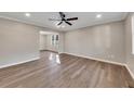 Spacious living room with hardwood floors and ceiling fan at 80 Yvette Ne Ct, Kennesaw, GA 30144