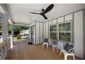 Relaxing front porch with ceiling fan and comfortable seating at 1841 Bayberry Dr, Atlanta, GA 30311