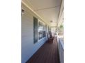 Relaxing rocking chairs on a spacious front porch at 399 Towler Dr, Loganville, GA 30052