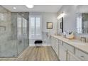Spa-like bathroom with large shower and double vanity at 104 Johnston Farm Ln, Woodstock, GA 30188