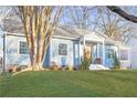 Cute light blue house with a spacious yard and mature trees at 1618 Athens Sw Ave, Atlanta, GA 30310