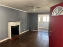 Living room with hardwood floors and fireplace at 678 Charlotte Nw Pl, Atlanta, GA 30318