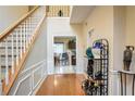 Two-story foyer with hardwood floors and a view of the kitchen at 3805 Dogwood Farm Rd, Decatur, GA 30034