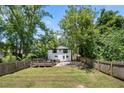 Spacious backyard with a deck and fenced-in area at 930 White St, Atlanta, GA 30310