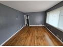 Living room with hardwood floors and gray walls at 2842 Delowe Dr, Atlanta, GA 30344