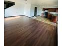 Open kitchen with dark brown cabinets and tiled floors at 1188 To Lani Path, Stone Mountain, GA 30083