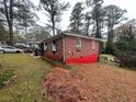 Side view of brick ranch house at 2621 Patrick Se Ct, Atlanta, GA 30317