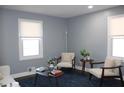 Bright living room with two armchairs and a coffee table at 2185 Fairfield St, Smyrna, GA 30080