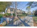 Exterior view of building with landscaping and trees at 5400 Roswell Rd # P2, Atlanta, GA 30342