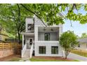 Two-story house with gray siding, white trim, and a front porch at 628 Robinson Se Ave # A, Atlanta, GA 30312