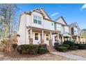 Two story townhome with a lovely front yard at 615 Royal Crescent Aly, Canton, GA 30115