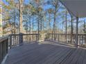 Large deck with wooded view at 8791 Daerwater Dr, Winston, GA 30187