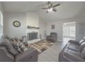 Living room with fireplace and vaulted ceiling at 8791 Daerwater Dr, Winston, GA 30187