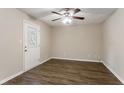 Spacious living room with vinyl flooring and ceiling fan at 2792 Plantation Dr, Atlanta, GA 30344