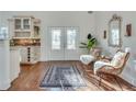 Bright kitchen with white cabinets, hardwood floors and French doors at 3204 Woodrow Ne Way, Atlanta, GA 30319