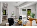 Inviting living room featuring modern decor, large windows, and stylish seating, creating a cozy atmosphere at 105 Georgia Se Ave # 5, Atlanta, GA 30312