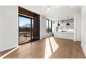 Bright and airy living room with hardwood floors and sliding glass doors at 105 Georgia Se Ave # 5, Atlanta, GA 30312