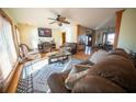 Spacious living area with hardwood floors, fireplace and large windows at 633 Duncan Rd, Oxford, GA 30054