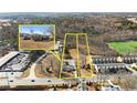 Aerial view showing house, lot, and surrounding area at 207 Arcado Nw Rd, Lilburn, GA 30047