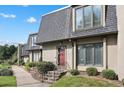Front view of townhome showcasing its architectural details and landscaping at 17 Ivy Gates Ne, Atlanta, GA 30342