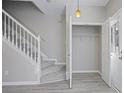 Entryway with coat closet and staircase leading upstairs at 1761 Stanwood Nw Dr, Kennesaw, GA 30152