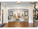 Bright and airy living room with hardwood floors, comfortable seating, and statement art at 1598 W Sussex Ne Rd, Atlanta, GA 30306