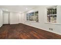 Spacious living room featuring hardwood floors and large windows at 1189 Rock Cut Rd, Forest Park, GA 30297