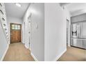 Light-filled entryway with hardwood floors and modern finishes at 609 Old Wheat Ne St, Atlanta, GA 30312