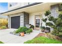 Inviting front entrance with modern design, landscaping, and a spacious porch at 416 Glen Iris Ne Dr, Atlanta, GA 30308