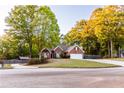 Brick house with attached garage and curb appeal at 2063 Emily Dr, Social Circle, GA 30025