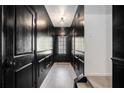 Dramatic entryway with black walls and wood flooring at 2829 Ridgeview Sw Dr, Atlanta, GA 30331