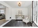 Bright entry with tile flooring, decorative console table, and comfortable seating at 2192 Spink St, Atlanta, GA 30318