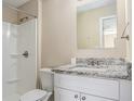 Bathroom with granite vanity and shower/tub combo at 475 Shannon Way, Lawrenceville, GA 30044