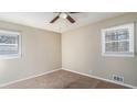 Spacious bedroom with ceiling fan and neutral decor at 475 Shannon Way, Lawrenceville, GA 30044